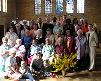 People in front of church window